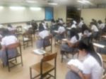 Blur Background University Students Writing Answer Doing Exam In Stock Photo