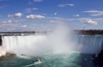 The Ship In Front Of The Mist Of The Niagara Falls Stock Photo