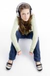 Sitting Female Listening Music Stock Photo