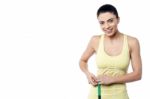 Woman Taking Body Measurements Stock Photo