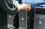 Man Fix Server Network In Data Center Room Stock Photo