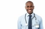 Happy Male Doctor With Stethoscope Stock Photo