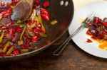 Fried Chili Pepper And Vegetable On A Wok Pan Stock Photo