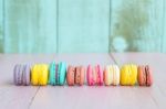 Vintage Colorful  Macarons On Pink Wooden Background Stock Photo