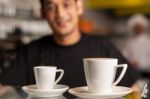 Coffee For You, Restaurant Staff In Background Stock Photo