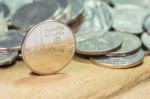 Coins Of Thailand. Wat Benchamabophit Or The Marble Temple In Bangkok, Thailand, Depicted In The Thai Five Baht Coin Stock Photo