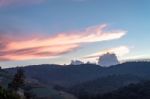 The Beauty Of The Sky When Light Hits The Clouds And Mountain Stock Photo