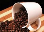 Coffee Beans On A Cup Stock Photo