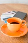 Hot Coffee Cup On Wooden Table Stock Photo