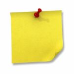 Yellow Sticky Note With Pin Stock Photo