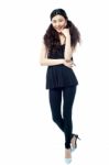 Full Length Portrait Of A Fashion Girl Stock Photo