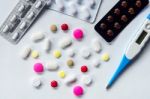 Top View Of The Pills On The White Background, Pack Of Tablet Drug And Capsule Pills On The Floor Stock Photo