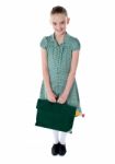 Smiling School Girl Holding Bag Stock Photo