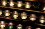 Background With The Beautiful Small Candles Stock Photo