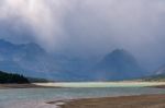 Storm Clouds Gathering Over Lake Sherburne Stock Photo