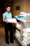 Female Holding Towel Stock Photo