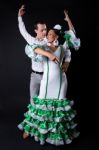 Young Flamenco Dancers In Beautiful Dress On Black Background Stock Photo