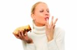 Woman Eating Panettone Stock Photo