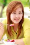 Girl Eating Food Stock Photo