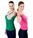 Woman Gesturing Thumbs Up Stock Photo