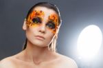 Orange And Red Rhinestones On A Girl Face Stock Photo