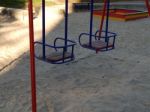 Children Playground, Swing Near The House  Stock Photo