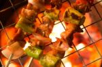 Grilling Shashlik On Barbecue Grill Stock Photo