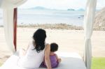 Mom With Child In Beach Stock Photo