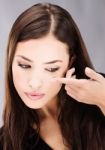 Woman Holding Contact Lens Stock Photo