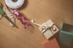 Gift Wrapping On A Wooden Stock Photo