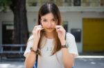 Portrait Of Thai Chinese Adult Glasses Beautiful Girl Denim Blue Bag Relax And Smile Stock Photo