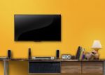 Led Tv On Concrete Wall With Wooden Furniture In Living Room Stock Photo