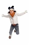 Excited Primary Girl Jumping With Joy Stock Photo