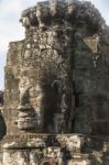 Ancient Stone Faces Of King Jayavarman Vii At The Bayon Temple, Stock Photo