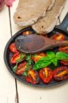 Baked Cherry Tomatoes With Basil And Thyme Stock Photo