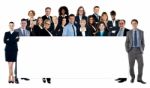 Diverse Business People Holding A Banner Stock Photo