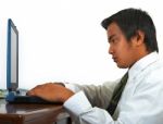 Man Working On His Computer Stock Photo