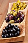 Variety Of Green, Black And Mixed Marinated Olives Stock Photo