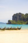 Long Tail Boats On A Beach In Thailand Stock Photo