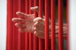 Hands Of Prisoner In Jail Stock Photo