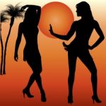 Silhouettes Of Dancing Women Stock Photo