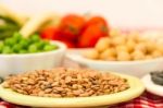 Variety Of Kitchen Ingredients With Fresh And Dried Legumes Stock Photo