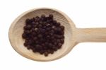 Pepper Seeds On Wooden Spoon Stock Photo