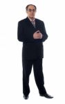 Elder Businessman standing Stock Photo