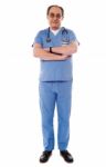 Senior Doctor With Arm Crossed  Stock Photo