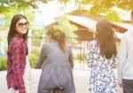 Group Of Asian Teenager Walking In The Park  Stock Photo