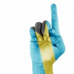 Flag Bahamas On Pointing Up Hand Stock Photo