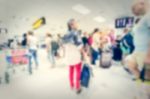 Blurred Crowd Of Tourist In The Airport Stock Photo