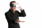 Isolated Young Businessman With Virtual Reality Glasses Stock Photo