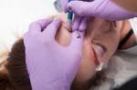 A Woman Getting Permanent Make Up Stock Photo